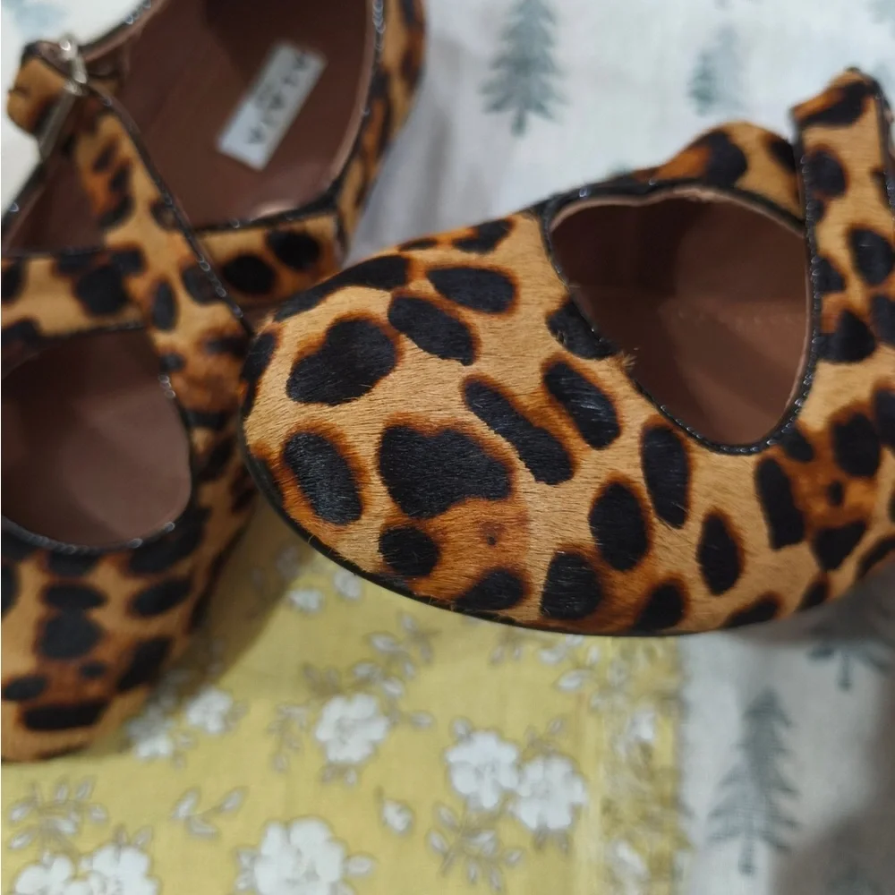 Alaia Leopard-Print Mary Jane Flats in Brown and Black